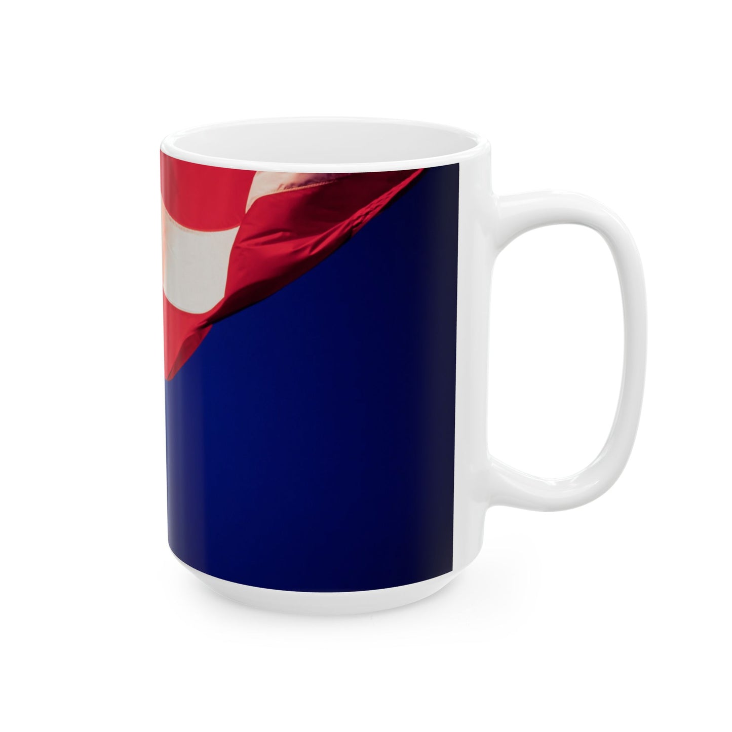 The Patriotic Colors of Red and White in the Stripes of the American Flag Wave Against a Deep Blue Sky, Perfect for an 11 or 15oz Mug.