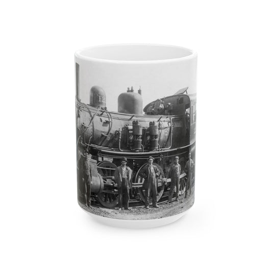 The Yard and Train Crew of Steam Locomotive 122 Pose for a Formal Portrait Against the Mighty Machine.