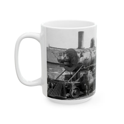 The Yard and Train Crew of Steam Locomotive 122 Pose for a Formal Portrait Against the Mighty Machine.
